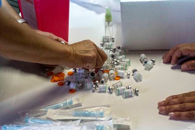 March 9, 2021, Firmat, Santa Fe, Argentina: Vials of the Sinopharm vaccine are counted during the vaccination of education workers at San Martin Hospital in Firmat, Santa Fe. Firmat Argentina - ZUMAm105 20210309_zaf_m105_004 Copyright: xPatricioxMurphyx