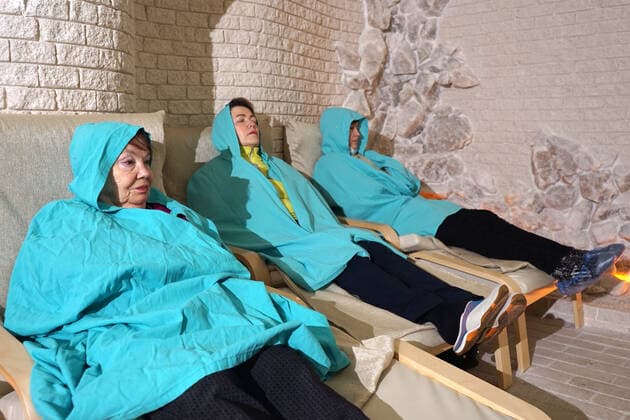 CHEBOKSARY, RUSSIA â€“ MARCH 9, 2021: Patients during a halotherapy session in a salt room at the Chuvashiyakurort sanatorium. The sanatorium delivers rehabilitation and care to patients after COVID-19. Chuvashiakurort offers hydrotherapy and mud bath therapy in combination with traditional sanatorium services and state-of-the-art medical technology. The unique feature of the sanatorium is therapeutic sapropelic mud from Kogoyar Lake, which is situated near the Volga River. Semyon Antonov TASS  TS0F8F13