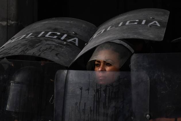 Mexican Women Join World Protest Of nternational Women™s Day TOLUCA, MEXICO - MARCH 8: Ð police protects a government building during riots of feminist groups who protest against gender-based violence, in the context of International Women™s Day. Hundreds of women take part in demonstrations worldwide, to demand justice for victims of femicide and stop violence against women, during the commemoration of International Women s Day . on March 8, 2021 in Toluca, Mexico Copyright: xAmareshxV.xNarrox EYEPIXGROUP_AVN_08032021_4584