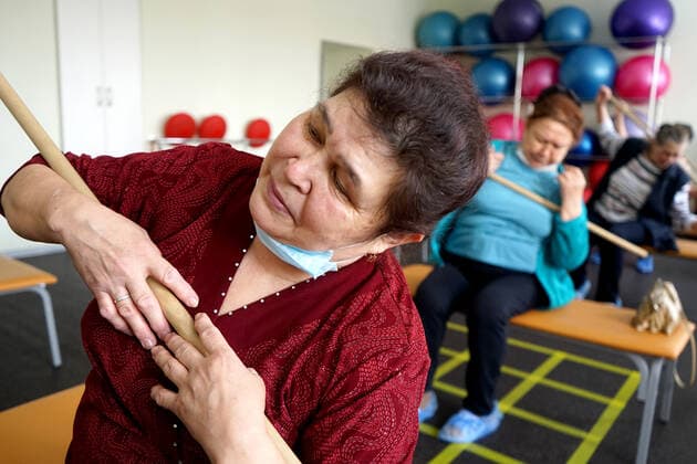 CHEBOKSARY, RUSSIA â€“ MARCH 9, 2021: Patients do exercises during a therapeutic physical training session in the Chuvashiyakurort sanatorium. The sanatorium delivers rehabilitation and care to patients after COVID-19. Chuvashiyakurort offers hydrotherapy and mud bath therapy in combination with traditional sanatorium services and state-of-the-art medical technology. The unique feature of the sanatorium is therapeutic sapropelic mud from Kogoyar Lake, which is situated near the Volga River. Semyon Antonov TASS  TS0F8F10