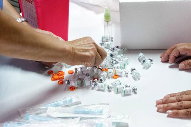 March 9, 2021, Firmat, Santa Fe, Argentina: Vials of the Chinese Sinopharm vaccine being counted on a table after being applied at San Martin Hospital as Argentina starts the immunization of education workers against COVID-19. Firmat Argentina - ZUMAs197 20210309_zaa_s197_024 Copyright: xPatricioxMurphyx