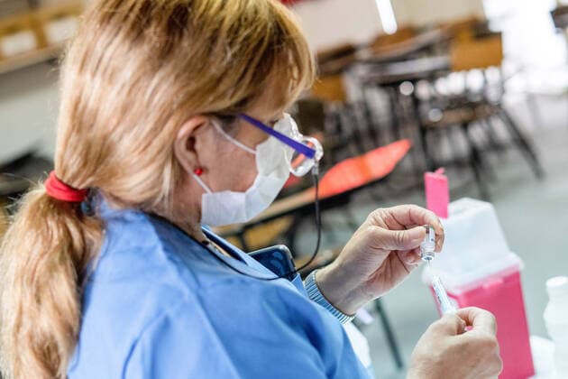 March 9, 2021, Firmat, Santa Fe, Argentina: A nurse prepares a shot of the Chinese Sinopharm vaccine at San Martin Hospital as Argentina starts the immunization of education workers against COVID-19. Firmat Argentina - ZUMAs197 20210309_zaa_s197_030 Copyright: xPatricioxMurphyx
