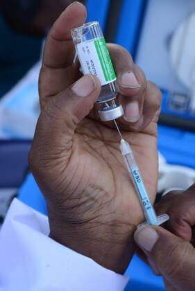 March 9, 2021, Nairobi, Kenya: A healthcare worker prepares to administer an Oxford AstraZeneca COVID-19 vaccine to a colleague at Mutuini Hospital in Nairobi. .Kenya on March 3, 2021 received its first batch of 1.02 million doses of Oxford AstraZeneca through global COVAX scheme as part of the 24 million doses the country is expected to import in a couple of months. The vaccine which is currently being distributed to various stations across the country will first be administered to healthcare workers, teachers and people whose immunity is compromised. Nairobi Kenya - ZUMAs197 20210309_zaa_s197_043 Copyright: xDennisxSigwex