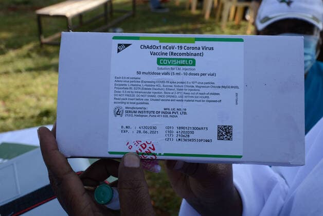March 9, 2021, Nairobi, Kenya: A healthcare worker displays a box containing the Oxford AstraZeneca COVID-19 vaccine at Mutuini Hospital in Nairobi. .Kenya on March 3, 2021 received its first batch of 1.02 million doses of Oxford AstraZeneca through global COVAX scheme as part of the 24 million doses the country is expected to import in a couple of months. The vaccine which is currently being distributed to various stations across the country will first be administered to healthcare workers, teachers and people whose immunity is compromised. Nairobi Kenya - ZUMAs197 20210309_zaa_s197_049 Copyright: xDennisxSigwex