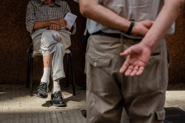 March 9, 2021, Buenos Aires, Argentina: Elderly citizens wait in their seats to receive the Covid19 Vaccination at Luna Park Stadium..Due to the overwhelming numbers and the limited space at the Luna Park stadium, many senior citizens had to wait, sitting in the sun while others had to receive the Covid19 vaccination from specified cars. Buenos Aires Argentina - ZUMAs197 20210309_zaa_s197_128 Copyright: xAlejoxManuelxAvilax