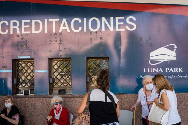 March 9, 2021, Buenos Aires, Argentina: Elderly citizens wait in their seats to receive the Covid19 Vaccination at Luna Park Stadium..Due to the overwhelming numbers and the limited space at the Luna Park stadium, many senior citizens had to wait, sitting in the sun while others had to receive the Covid19 vaccination from specified cars. Buenos Aires Argentina - ZUMAs197 20210309_zaa_s197_131 Copyright: xAlejoxManuelxAvilax