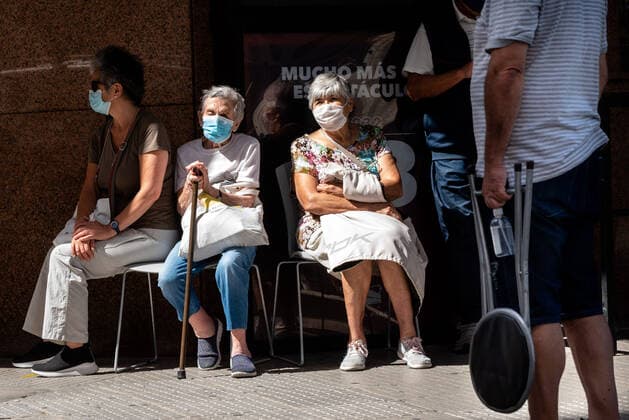 March 9, 2021, Buenos Aires, Argentina: Elderly citizens wait in their seats to receive the Covid19 Vaccination at Luna Park Stadium..Due to the overwhelming numbers and the limited space at the Luna Park stadium, many senior citizens had to wait, sitting in the sun while others had to receive the Covid19 vaccination from specified cars. Buenos Aires Argentina - ZUMAs197 20210309_zaa_s197_132 Copyright: xAlejoxManuelxAvilax