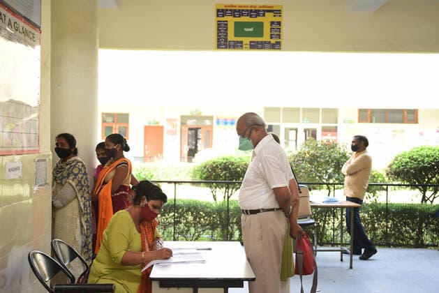 GURUGRAM, INDIA - MARCH 9: A health worker registers people for Covid-19 test at Urban Primary Health Centre, at Wazriabad, on March 9, 2021 in Gurugram, India. (Photo by Vipin Kumar Hindustan Times )