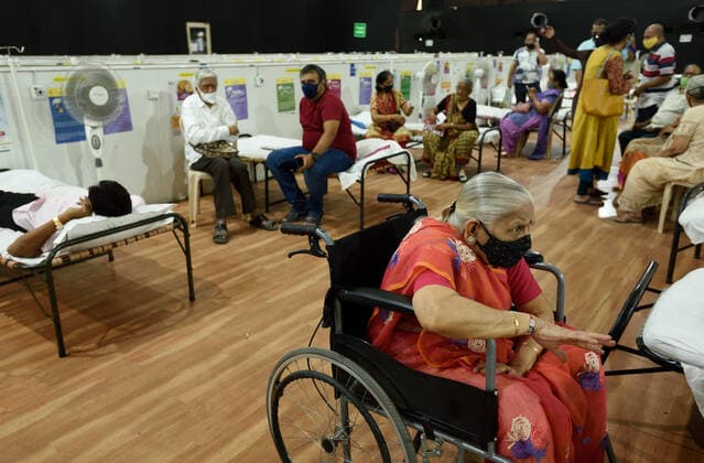 MUMBAI, INDIA - MARCH 9: Senior citizens at observation room after getting their first dose of Covid-19 vaccine, at Dahisar, on March 9, 2021 in Mumbai, India. (Photo by Satish Bate Hindustan Times )