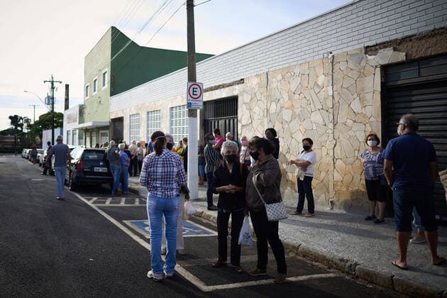 March 10, 2021, Franca, Sao Paulo, Brazil: Elderly between 85 and 89 years old line up to receive the second dose of the vaccine against covid-19 in Franca, Sao Paulo, Brazil, on March 10, 2021. Franca Brazil - ZUMAv129 20210310_znp_v129_006 Copyright: xIgorxDoxValex