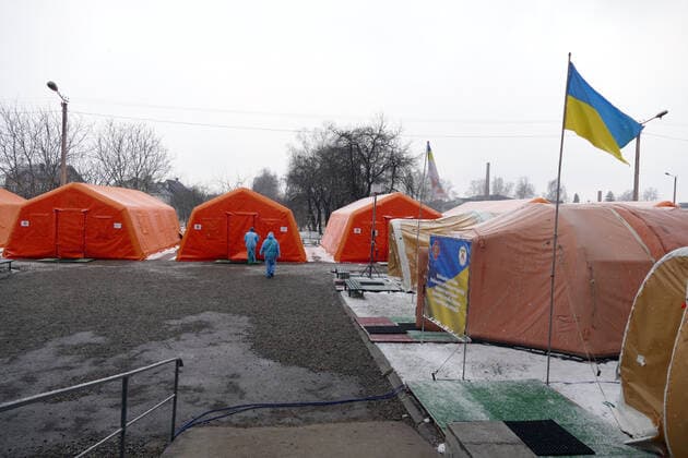 BOHORODCHANY, UKRAINE - MARCH 10, 2021 - The mobile hospital of the Rapid Response Centre of the State Emergency Service set up outside the Bohorodchany Central District Hospital starts admitting first COVID-19 patients, Bohorodchany urban-type settlement, Ivano-Frankivsk Region, western Ukraine. Mobile hospital of State Emergency Service in Bohorodchany  Copyright: xYuriixRylchukx