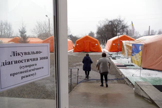 BOHORODCHANY, UKRAINE - MARCH 10, 2021 - The mobile hospital of the Rapid Response Centre of the State Emergency Service set up outside the Bohorodchany Central District Hospital starts admitting first COVID-19 patients, Bohorodchany urban-type settlement, Ivano-Frankivsk Region, western Ukraine. Mobile hospital of State Emergency Service in Bohorodchany  Copyright: xYuriixRylchukx