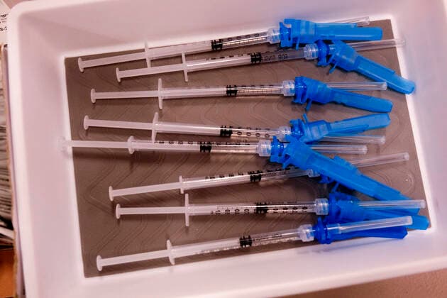 March 11, 2021, Los Angeles, California, USA: Syringes containing the new one-shot Johnson & Johnson COVID-19 vaccine at a vaccination event at Baldwin Hills Crenshaw Plaza in Los Angeles on March 11, 2021. The event was hosted by the California Department of Public Health and FEMA (Federal Emergency Management Agency). The Johnson & Johnson vaccine is now the third coronavirus vaccine to receive emergency approval for use in the United States. Los Angeles USA - ZUMAc68_ 20210311_zaf_c68_003 Copyright: xRingoxChiux