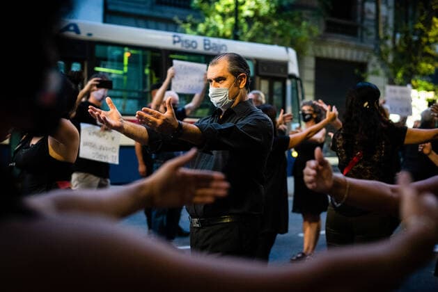 March 11, 2021, Buenos Aires, Argentina: Workers are seen practicing dance moves during the demonstration..Tango workers gathered at the doors of the Ministry of Culture to ask for the resumption of activity in the City of Buenos Aires and show that they have been unable to work for a year. Buenos Aires Argentina - ZUMAs197 20210311_zaa_s197_132 Copyright: xAlejoxManuelxAvilax