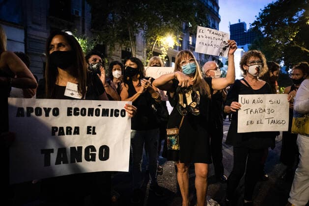 March 11, 2021, Buenos Aires, Argentina: Workers hold placards during the demonstration..Tango workers gathered at the doors of the Ministry of Culture to ask for the resumption of activity in the City of Buenos Aires and show that they have been unable to work for a year. Buenos Aires Argentina - ZUMAs197 20210311_zaa_s197_139 Copyright: xAlejoxManuelxAvilax
