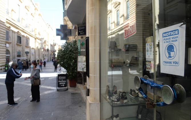 (210311) -- VALLETTA, March 11, 2021 -- Photo taken on March 11, 2021 shows a closed store in Valletta, Malta. The Maltese government on Wednesday announced the closure of schools and non-essential shops in response to a spike in new COVID-19 cases, almost two-thirds of which are attributable to the variant first reported in the UK. The new measures, which will be in force until April 11, include the closure of all non-essential shops and those providing non-essential services such as hairdressers and beauticians while the limitation of group gatherings in public down to a maximum of four people. (Photo by Xinhua) MALTA-VALLETTA-COVID-19-RESTRICTIONS JonathanxBorg 