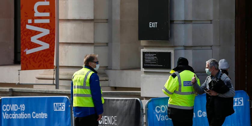 (210312) -- LONDON, March 12, 2021 -- Photo taken on March 11, 2021 shows a man walking out of the NHS COVID-19 Vaccination Centre in the Science Museum in London, Britain. Vaccination centres have opened at Westminster Abbey and Science Museum, according to NHS (National Health Service). ) BRITAIN-LONDON-COVID-19-VACCINATION CENTRES HanxYan 