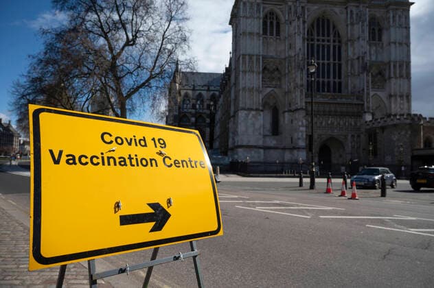 (210312) -- LONDON, March 12, 2021 -- Photo taken on March 11, 2021 shows a sign outside the COVID-19 Vaccination Centre in Westminster Abbey in London, Britain. Vaccination centres have opened at Westminster Abbey and Science Museum, according to NHS (National Health Service). (Photo by Xinhua) BRITAIN-LONDON-COVID-19-VACCINATION CENTRES RayxTang 