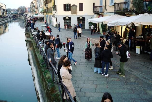 Milan, Last days for the takeaway aperitif to be in the dark or reinforced orange zone, before moving to the red zone for Covid infections in the Lombardy region, in the photo people on the Naviglio Grande and Darsena Editorial Usage Only  Copyright: xDuilioxPiaggesix xIPAx