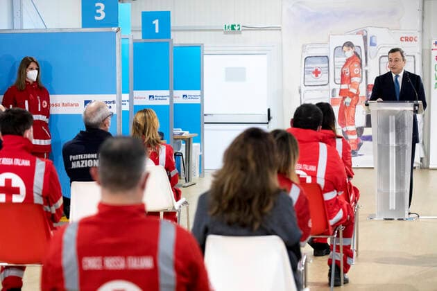 (210313) -- ROME, March 13, 2021 () -- Italian Prime Minister Mario Draghi speaks at the mass COVID-19 vaccination hub at Fiumicino Airport in Italy, on March 12, 2021. Speaking at a COVID-19 hub at the Fiumicino international airport in the Italian capital on Friday, Prime Minister Mario Draghi pledged to accelerate the national vaccination campaign, which has reached some 6.3 million people so far, according to government s figures. (Pool via ) ITALY-ROME-PM-COVID-19 VACCINATION HUB-VISIT Xinhua 