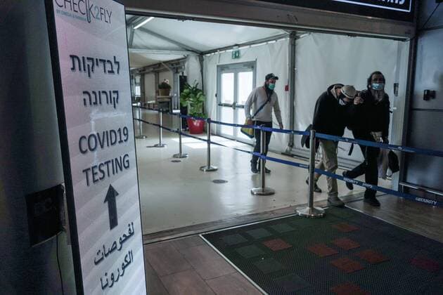 March 14, 2021, Lod, Israel: All incoming travelers at Tel AvivÃ¢â‚¬â ¢s Ben Gurion International Airport are tested for COVID-19 and home quarantine requirement is maintained as government decides to allow a daily quota of 3,000 Israelis to arrive from any destination amid decreasing infection and transmission rates and ahead of national elections for parliament scheduled for 23rd March, 2021. IsraelÃ¢â‚¬â ¢s gateways have been largely closed since 25th January, 2021 and there are estimates of tens of thousands of Israelis still stranded abroad struggling to return for the elections. Lod Israel - ZUMAa126 20210314_zap_a126_002 Copyright: xNirxAlonx