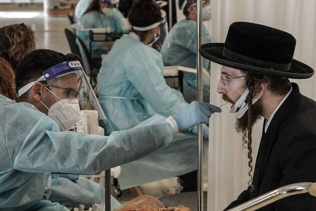 March 14, 2021, Lod, Israel: All incoming travelers at Tel AvivÃ¢â‚¬â ¢s Ben Gurion International Airport are tested for COVID-19 and home quarantine requirement is maintained as government decides to allow a daily quota of 3,000 Israelis to arrive from any destination amid decreasing infection and transmission rates and ahead of national elections for parliament scheduled for 23rd March, 2021. IsraelÃ¢â‚¬â ¢s gateways have been largely closed since 25th January, 2021 and there are estimates of tens of thousands of Israelis still stranded abroad struggling to return for the elections. Lod Israel - ZUMAa126 20210314_zap_a126_016 Copyright: xNirxAlonx