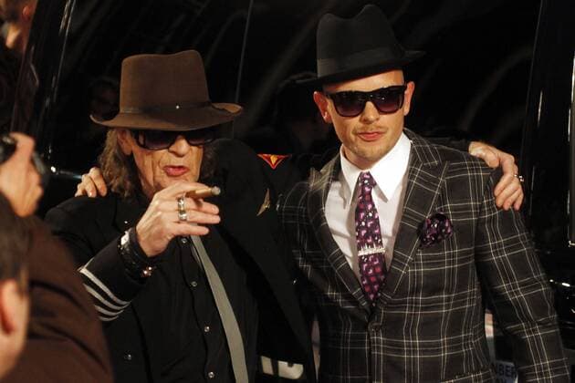 Udo Lindenberg und Jan Delay beim Echo 2012 dem Deutschen Musikpreis auf dem Roten Teppich vor der Verleihung beim Autogramme schreiben an der Messe Berlin. Copyright: xEventpressxStaufenbergx