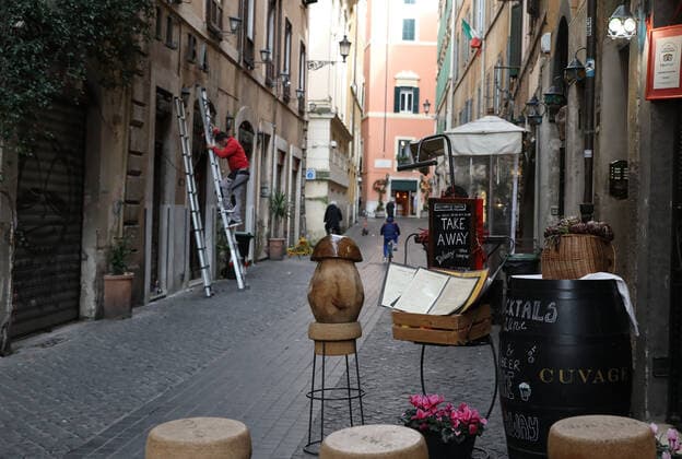 (210316) -- ROME, March 16, 2021 -- A sign promoting takeaway service is seen outside a restaurant in Rome, Italy, March 15, 2021. Italy entered into a new period of semi-lockdown on Monday, with over half of its 20 regions falling into the red zone and subject to the maximum level of restrictions. ) ITALY-ROME-COVID-19-SEMI-LOCKDOWN ChengxTingting 