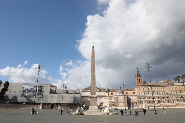 (210316) -- ROME, March 16, 2021 -- People walk across the Piazza del Popolo in Rome, Italy, March 15, 2021. Italy entered into a new period of semi-lockdown on Monday, with over half of its 20 regions falling into the red zone and subject to the maximum level of restrictions. ) ITALY-ROME-COVID-19-SEMI-LOCKDOWN ChengxTingting 