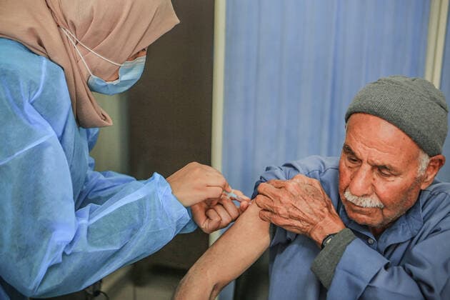 March 17, 2021, Gaza City, The Gaza Strip, Palestine: A shot of the Sputnik V Covid-19 vaccine is prepared to be administered at the Ministry of Health Sabha Al Harazeen clinic, in Al Shejaeiya neighborhood, in the east of Gaza City, 17 March 2021. The Palestinian Authority received on 17 March around 60,000 coronavirus vaccine doses as a first shipment through the COVAX initiative. People start to receive doses of Russia s Sputnik V COVID-19 coronavirus vaccine in the Ministry of Health clinics and United Nations Relief and Works Agency for Palestine Refugees (UNRWA) s clinics. Gaza City Palestine - ZUMAq100 20210317_zaa_q100_002 Copyright: xAbedxAlrahmanxAlkahloutx