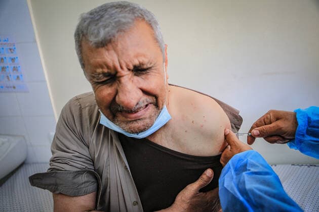 March 17, 2021, Gaza City, The Gaza Strip, Palestine: A shot of the Sputnik V Covid-19 vaccine is prepared to be administered at the Ministry of Health Sabha Al Harazeen clinic, in Al Shejaeiya neighborhood, in the east of Gaza City, 17 March 2021. The Palestinian Authority received on 17 March around 60,000 coronavirus vaccine doses as a first shipment through the COVAX initiative. People start to receive doses of Russia s Sputnik V COVID-19 coronavirus vaccine in the Ministry of Health clinics and United Nations Relief and Works Agency for Palestine Refugees (UNRWA) s clinics. Gaza City Palestine - ZUMAq100 20210317_zaa_q100_006 Copyright: xAbedxAlrahmanxAlkahloutx