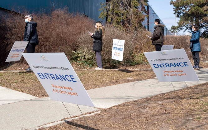 March 17, 2021, Toronto, on, Canada: Visitors line up at a vaccination clinic in Toronto on Wednesday, March 17, 2021. Toronto Canada  - ZUMAc35_ 20210317_zaf_c35_087 Copyright: xFrankxGunnx