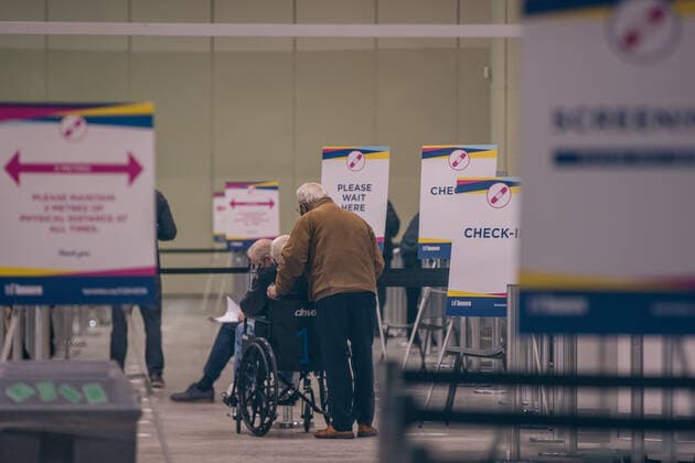 March 17, 2021, Toronto, Canada: People seen inside a Metro Convention Centre waiting to receive their first of two COVID-19 vaccine shots..Toronto has launched Let s get TO Vaccinated program to eradicate COVID-19 pandemic. Toronto Canada - ZUMAs197 20210317_zaa_s197_200 Copyright: xShawnxGoldbergx