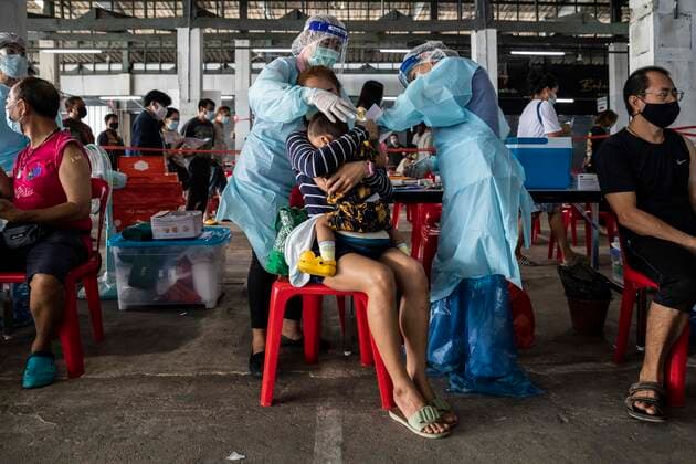 March 19, 2021, Thailand: A health worker administers a dose of CoronaVac, a Covid-19 coronavirus vaccine developed by Chinaâ€⠢s Sinovac Biotech ltd, in Bangkok, Thailand, on Friday March 19, 2021. Health workers have been vaccinating 600 residents per day, after a cluster of Covid-19 coronavirus cases were discovered at the Bang Khae market in Bangkok on Wednesday, March 17. Thailand - ZUMAm249 20210319_zip_m249_008 Copyright: xAndrexMalerbax