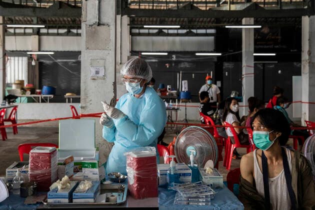 March 19, 2021, Thailand: A health worker administers a dose of CoronaVac, a Covid-19 coronavirus vaccine developed by ChinaÃ¢â‚¬â ¢s Sinovac Biotech ltd, in Bangkok, Thailand, on Friday March 19, 2021. Health workers have been vaccinating 600 residents per day, after a cluster of Covid-19 coronavirus cases were discovered at the Bang Khae market in Bangkok on Wednesday, March 17. Thailand - ZUMAm249 20210319_zip_m249_010 Copyright: xAndrexMalerbax