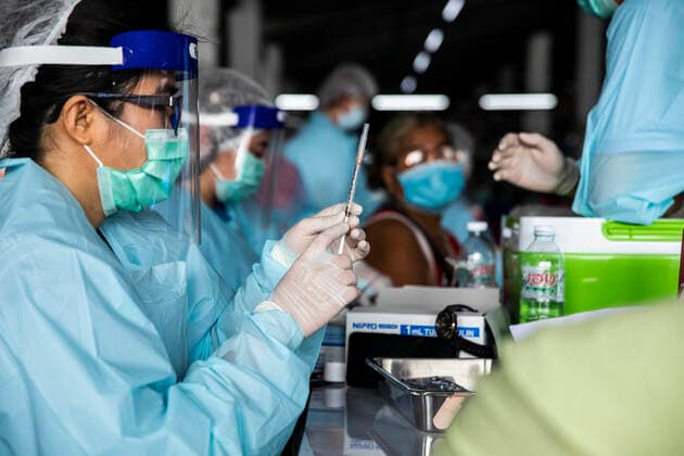 March 19, 2021, Thailand: A health worker prepares a dose of CoronaVac, a Covid-19 coronavirus vaccine developed by ChinaÃ¢â‚¬â ¢s Sinovac Biotech ltd, in Bangkok, Thailand, on Friday March 19, 2021. Health workers have been vaccinating 600 residents per day, after a cluster of Covid-19 coronavirus cases were discovered at the Bang Khae market in Bangkok on Wednesday, March 17. Thailand - ZUMAm249 20210319_zip_m249_012 Copyright: xAndrexMalerbax