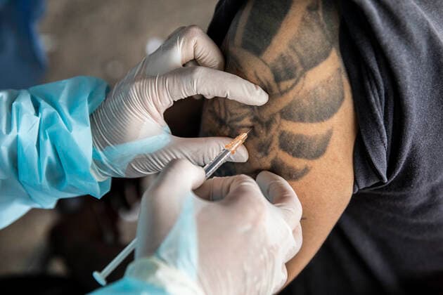 March 19, 2021, Thailand: A health worker administers a dose of CoronaVac, a Covid-19 coronavirus vaccine developed by ChinaÃ¢â‚¬â ¢s Sinovac Biotech ltd, in Bangkok, Thailand, on Friday March 19, 2021. Health workers have been vaccinating 600 residents per day, after a cluster of Covid-19 coronavirus cases were discovered at the Bang Khae market in Bangkok on Wednesday, March 17. Thailand - ZUMAm249 20210319_zip_m249_014 Copyright: xAndrexMalerbax