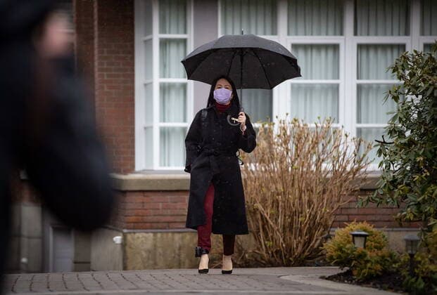 March 19, 2021, Vancouver, BC, Canada: Meng Wanzhou, chief financial officer of Huawei, leaves her home to attend a hearing at B.C. Supreme Court, in Vancouver, B.C., Friday, March 19, 2021. Vancouver Canada - ZUMAc35_ 20210319_zaf_c35_027 Copyright: xDarrylxDyckx