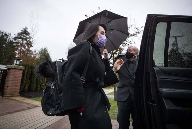 March 19, 2021, Vancouver, BC, Canada: Meng Wanzhou, chief financial officer of Huawei, leaves her home to attend a hearing at B.C. Supreme Court, in Vancouver, B.C., Friday, March 19, 2021. Vancouver Canada - ZUMAc35_ 20210319_zaf_c35_032 Copyright: xDarrylxDyckx