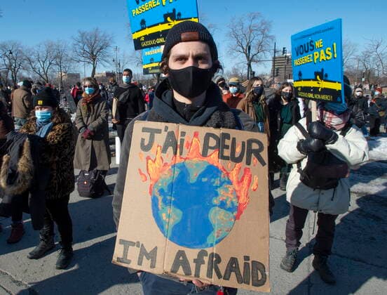 March 19, 2021, Montreal, PQ, Canada: Protesters take part in a demonstration calling for climate and social justice in Montreal, Friday, March 19, 2021. Montreal Canada  - ZUMAc35_ 20210319_zaf_c35_081 Copyright: xRyanxRemiorzx