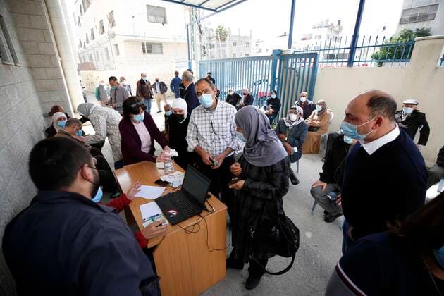 March 21, 2021, Nablus, West Bank, Palestinian Territory: Palestinians receive the dose of the coronavirus disease (COVID-19) vaccine during a campaign to vaccinate front-line for those aged over 75, cancer patients and medical personnel, at the health ministry in the West Bank city of Nablus, on March 21, 2021 Nablus Palestinian Territory - ZUMAap3_ 20210321_zaf_ap3_032 Copyright: xShadixJarar Ahx