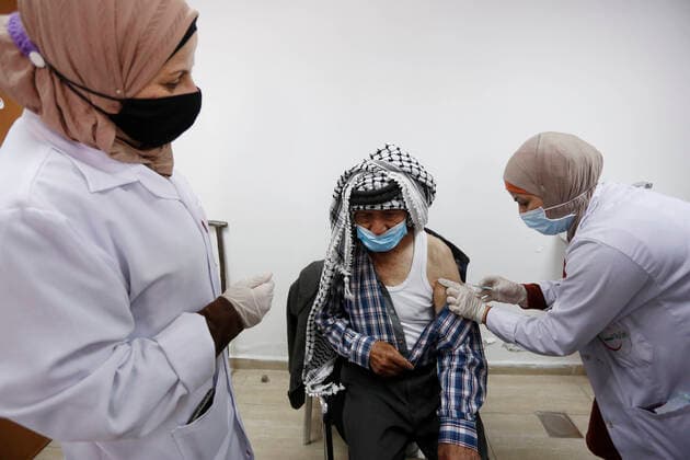 March 21, 2021, Nablus, West Bank, Palestinian Territory: Palestinians receive the dose of the coronavirus disease (COVID-19) vaccine during a campaign to vaccinate front-line for those aged over 75, cancer patients and medical personnel, at the health ministry in the West Bank city of Nablus, on March 21, 2021 Nablus Palestinian Territory - ZUMAap3_ 20210321_zaf_ap3_035 Copyright: xShadixJarar Ahx