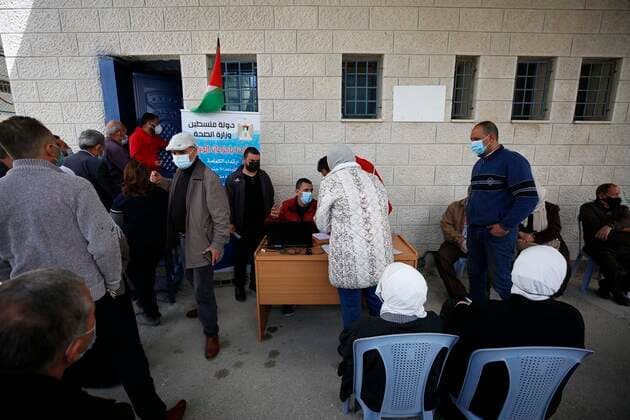 March 21, 2021, Nablus, West Bank, Palestinian Territory: Palestinians receive the dose of the coronavirus disease (COVID-19) vaccine during a campaign to vaccinate front-line for those aged over 75, cancer patients and medical personnel, at the health ministry in the West Bank city of Nablus, on March 21, 2021 Nablus Palestinian Territory - ZUMAap3_ 20210321_zaf_ap3_041 Copyright: xShadixJarar Ahx