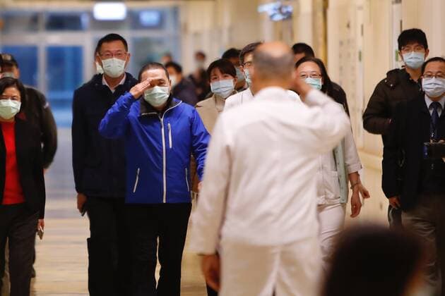 March 22, 2021, Taipei, Taipei, Taiwan: Far Eastern Hospital Superintendent Mr Lin Fang-Yue welcomes New Taipei CityÃ¢â‚¬â ¢s Mayor Mr Hou You-Yi during a press conference on vaccinations against Covid-19, as Taiwan begins vaccinations, at Far Eastern Hospital in Taipei. Medical workers including doctors and nurses, predominant officials and those aged 65 or above will be inoculated first across Taiwan whilst the Taiwanese vaccines remain clinical trials. Taipei Taiwan - ZUMAs313 20210322_zip_s313_002 Copyright: xDanielxCengxShou-Yix