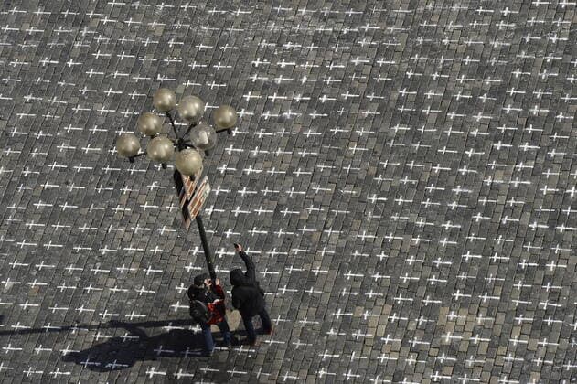 The Million Moments for Democracy civic group honored the memory of those who died with coronavirus by drawing thousands of little crosses at Old Town Square in Prague, Czech Republic, March 22, 2021. The cross should also symbolize the ineffectiveness of the government s COVID combat. (CTKxPhoto KaterinaxSulova) CTKPhotoP202103220299201  _SUK6137