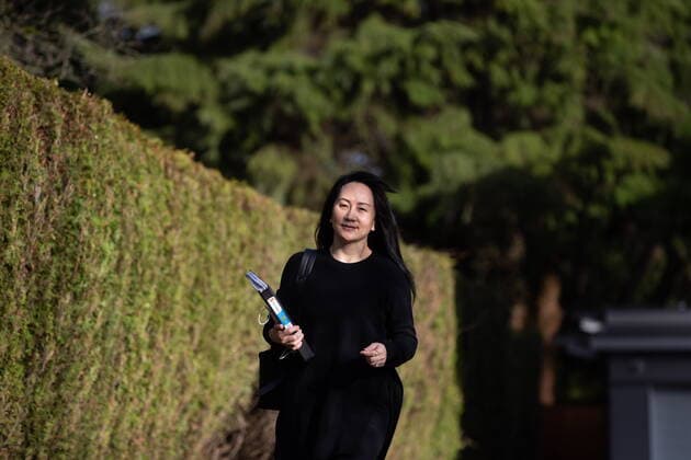 March 22, 2021, Vancouver, BC, Canada: Meng Wanzhou, chief financial officer of Huawei, carries a binder of documents as she leaves her home to attend a hearing at B.C. Supreme Court, in Vancouver, on Monday, March 22, 2021. Vancouver Canada - ZUMAc35_ 20210322_zaf_c35_028 Copyright: xDarrylxDyckx