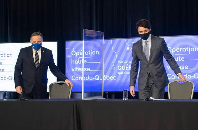 March 22, 2021, TROIS-RIVIERES, PQ, Canada: Prime Minister Justin Trudeau, right, and Quebec Premier Francois Legault walk in to announce high speed internet for Quebec regions, Monday, March 22, 2021 in Trois-Rivieres Que. TROIS-RIVIERES Canada  - ZUMAc35_ 20210322_zaf_c35_043 Copyright: xJacquesxBoissinotx