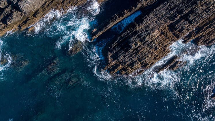 Creative Highlights World Aerial view of cliffs and Waves i Cabo Sardao Atlantic coast Portugal Copyright: xx