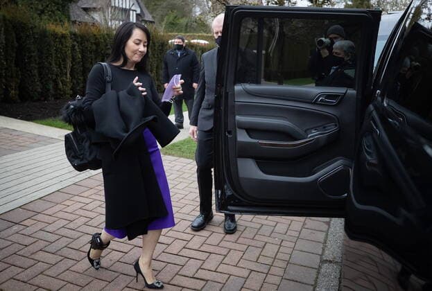 March 23, 2021, Vancouver, BC, Canada: Meng Wanzhou, chief financial officer of Huawei, leaves her home to attend a hearing at B.C. Supreme Court in Vancouver on Tuesday, March 23, 2021. Vancouver Canada  - ZUMAc35_ 20210323_zaf_c35_017 Copyright: xDarrylxDyckx