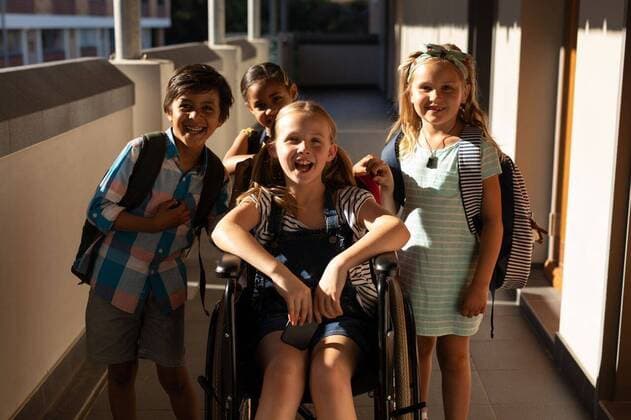 Disable schoolgirl with classmates looking at camera in hallway Front view of disable schoolgirl with classmates looking at camera in hallway of elementary school, model released, , property released, capetown, 28.01.2019, 1228125.jpg, school, classroom, hallway, casual clothing, school kid, schoolboy, schoolgirl, student, classmate, standing, sitting, smiling, looking, happy, happiness, fun, joy, holding, bad, wheelchair, disabled, handicapped, physical impairment, childhood, innocence, development, education, academic, information, knowledge, lifestyle, elementary, intelligent, intelligence, wisdom, together, group, friend, diversity, diverse, multi-ethnic, ethnicity, ethnically diverse Child, Boy, Male, Mixed-Race, Girl, Female, Caucasi